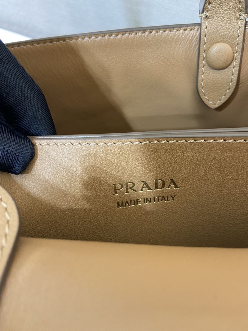 Pra*a top handle bags